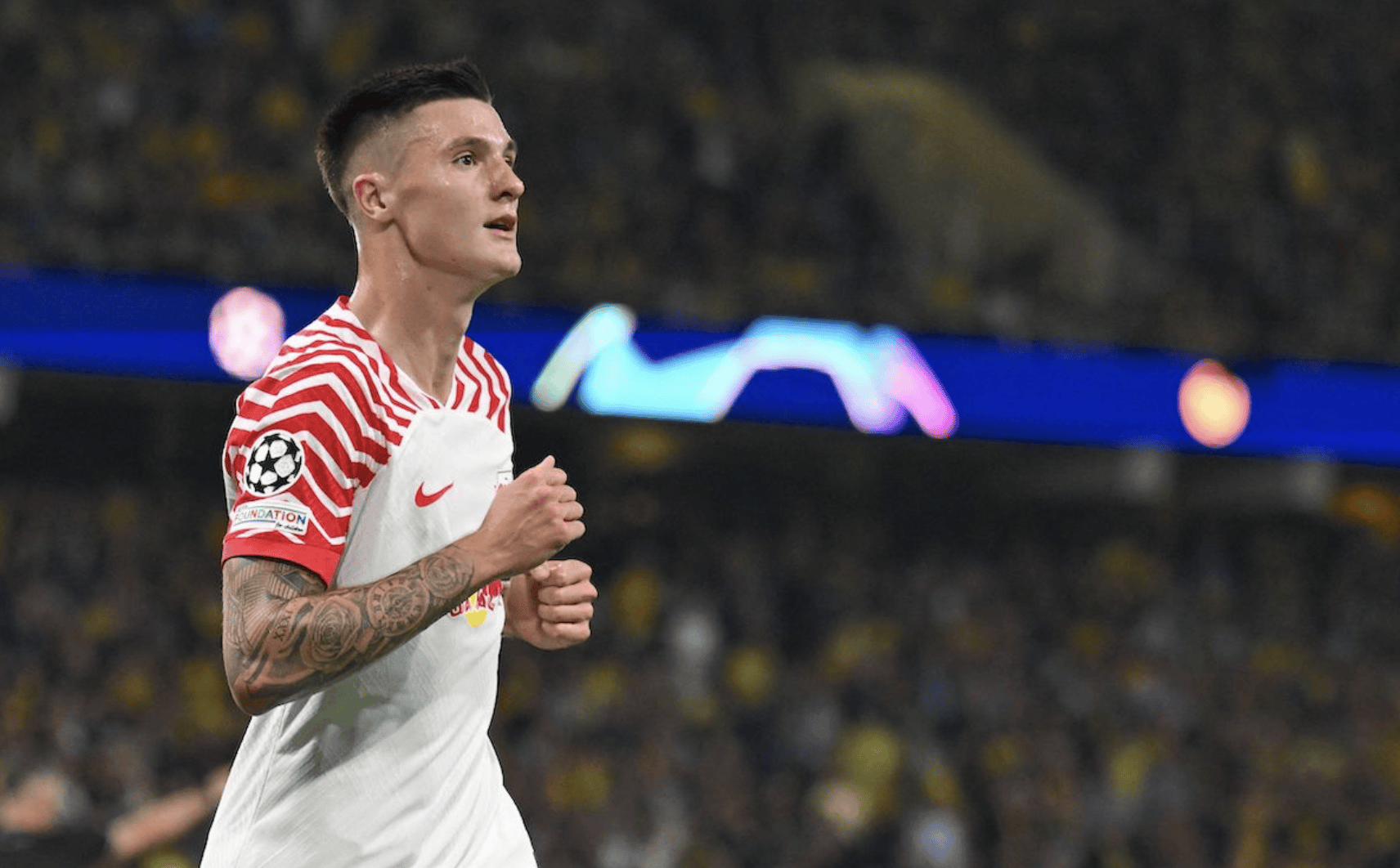 包含莱比锡客场逆转门兴，德甲争冠形势白热化的词条